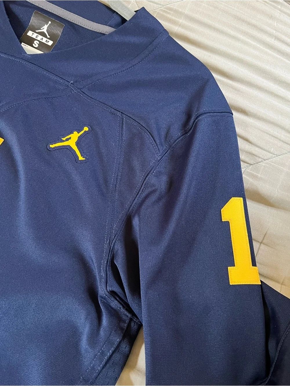 Jordan Navy and Yellow Football Jersey with Number 1